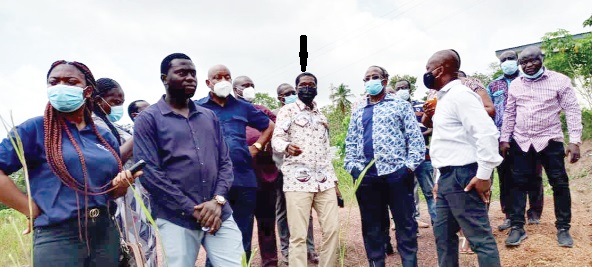 Dr Norris Hammah (arrowed), the Administrator of the MDF, explaining a point to Mr Sulemanu Koney (2nd from right), CEO of the Ghana Chamber of Mines. With them are members of the MDF Board and other officials on the trip